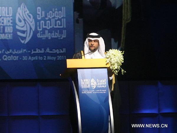 Sheikh Saoud Bin Abdulrahman Al Thani (L), secretary general of Qatar Olympic Committee (QOC) speaks at the opening of the 9th World Conference on Sport and Environment being held in Doha, capital of Qatar on April 30, 2011. The three-day conference was jointly organized by the International Olympic Committee (IOC), the United Nations Environment Programme (UNEP) and the Qatar Olympic Committee. [Xinhua] 