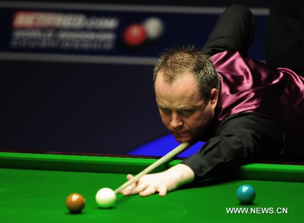 John Higgins of Scotland plays during his final match against Judd Trump of England in 2011's World Snooker Championship in Sheffield, Britain, May 2, 2011. Higgins won 18-15 to claim the title for the fourth time. (Xinhua/Zeng Yi) 