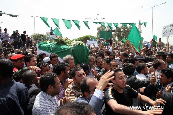 libyan leader muammar gaddafi attend the funeral of gaddafi s son saif ...