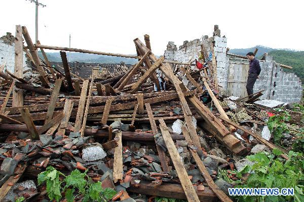 A house is seen collapse after a rainstorm in Changmei County, southwest China&apos;s Guangxi Zhuang Autonomous Region, May 3, 2011. A heavy rainstorm hit the county on Monday afternoon, causing 200 houses damaged but no casualties.