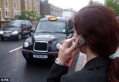 Good call: Passengers will be able to pay for a cab ride using their mobile phones - and get their phones charged up at the same time.