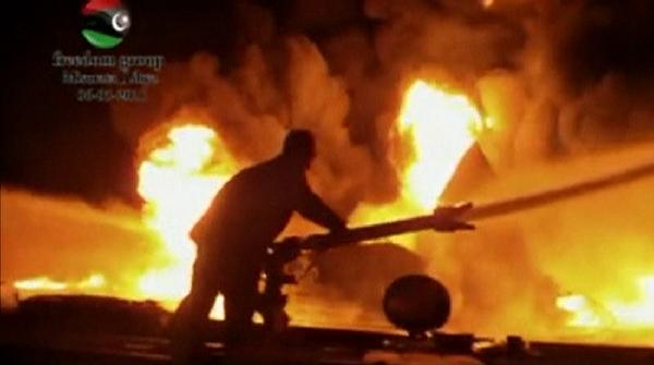 In this amateur video a fuel depot goes up in flames, in Misrata, Libya, Saturday, May 7, 2011.