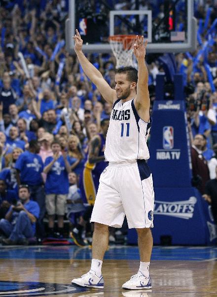 Dallas Mavericks guard Jose Barea celebrates victory against the Los Angeles Lakers at the end of Game 4 of the NBA Western Conference semi-final basketball playoff in Dallas, Texas, May 8, 2011. (Xinhua/Reuters Photo) 