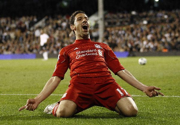 Liverpool's Maxi Rodriguez celebrates his third goal against Fulham during their English Premier League soccer match at Craven Cottage in London May 9, 2011. Liverpool improved its chances of finishing fifth in the Premier League and earning a spot in next season's Europa League by winning 5-2 at Fulham on Monday. [Xinhua/Reuters]