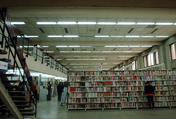 Readers are seen in southern component of the National Library of China in Beijing on May 9, 2011.