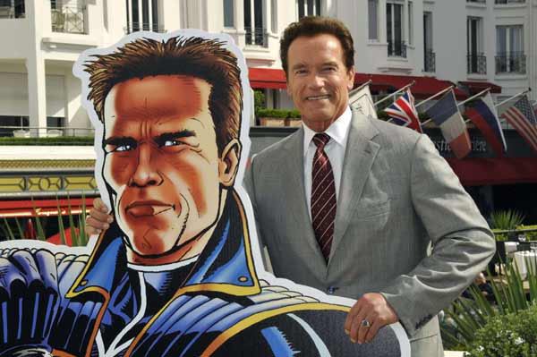Former California Governor Arnold Schwarzenegger poses during the photocall of the animated tv series 'The Governator' during the yearly MIPTV, the International Television Programs Market, in Cannes, southeastern France, April 4, 2011. 