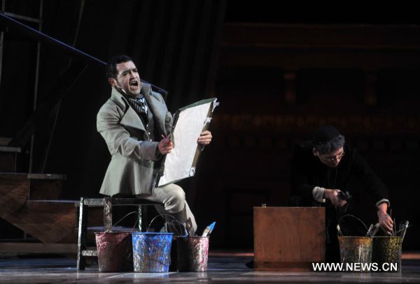 Artists perform during a dress rehearsal of Giacomo Puccini's opera 'Tosca' in Beijing, capital of China, May 10, 2011. The version of 'Tosca', directed by Giancarlo Del Monaco, is due to premiere in the National Centre for the Performing Arts in Beijing on Thursday.