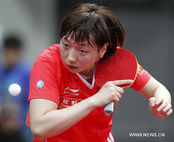 Fan Ying of China returns a ball during the third round match of women's singles against Fukuhara Ai of Japan in World Table Tennis Championships (WTTC) at Ahoy Arena in Rotterdam, Netherlands, May 11, 2011. Fan Ying won the game 4-1. (Xinhua/Wang Lili)