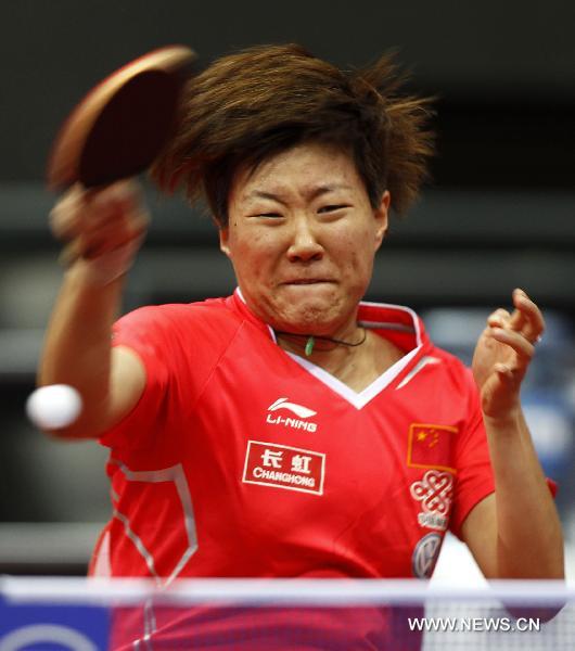 Guo Yan of China returns the ball during the third round match of women's singles against Sun Beibei of Singapore in World Table Tennis Championships (WTTC) at Ahoy Arena in Rotterdam, Netherlands, May 11, 2011. Guo won 4-1. (Xinhua/Wang Lili)