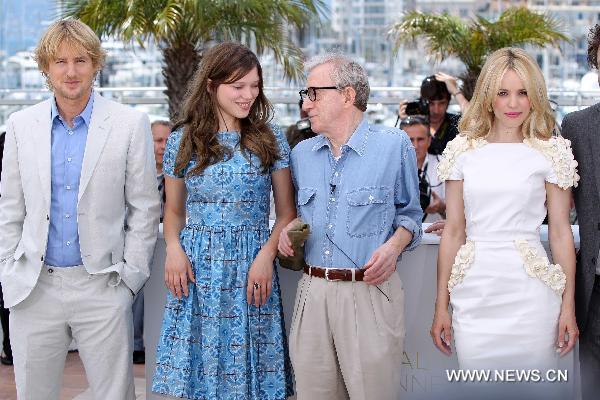 U.S. director Woody Allen (3rd L) and French actress Lea Seydoux (2nd L) attend a photocall for the film 'Midnight in Paris' at the 64th Cannes Film Festival in Cannes, France, on May 11, 2011. The 64th Cannes Film Festival is held from May 11 to 22. 