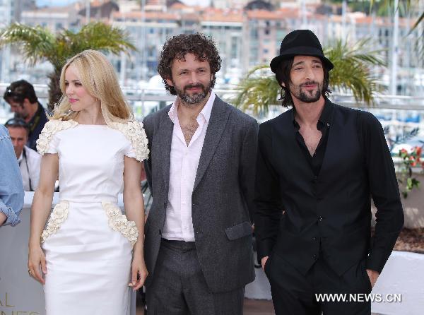 ((L-R) Canadian actress Rachel McAdams, British actor Michael Sheen, and U.S. actor Adrien Brody attend a photocall for the film 'Midnight in Paris' at the 64th Cannes Film Festival in Cannes, France, on May 11, 2011. The 64th Cannes Film Festival is held from May 11 to 22.