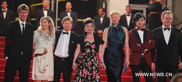 Cast members of 'We Need to Talk About Kevin' pose on the red carpet before the screening at the 64th Cannes Film Festival in Cannes, on May 12, 2011. 