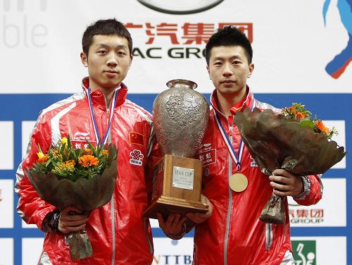 China's Ma Long and Xu Xin captured the world title in men's doubles at the World Table Tennis Championships in Rotterdam on Saturday.