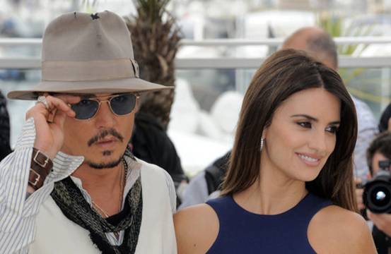 Actress Penelope Cruz and actor Johnny Depp attend the 'Pirates of the Caribbean: On Stranger Tides' premiere at the Palais des Festivals during the 64th Cannes Film Festival on May 14, 2011 in Cannes, France.