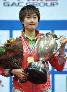 Ding Ning of China reacts during the awarding ceremony of the final of women's singles against her compatriot Li Xiaoxia in the 2011 World Table Tennis Championships (WTTC) at Ahoy Arena in Rotterdam, the Netherlands, May 14, 2011. Ding Ning won 4-2 to claim the champion of the event. (Xinhua/Wu Wei)(lm) 