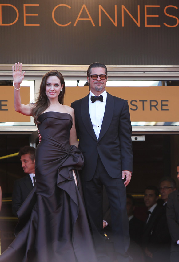 Brad Pitt and Angelina Jolie arrive for the premiere of the film 'The Tree of Life' in competition at the 64th Cannes Film Festival in Cannes, France, May 16, 2011. [Photo/Xinhua]