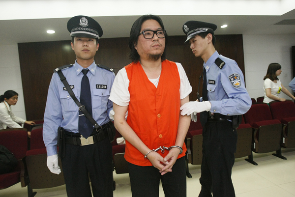 Gao Xiaosong hears the verdict in Dongcheng District No.4 People's Court.