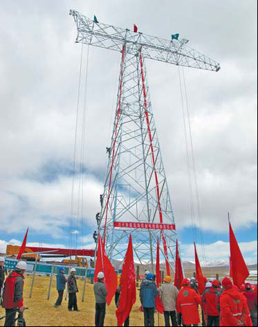 The highest transmission tower of the Qinghai-Tibet Power Grid Interconnection Project. The grid is expected to end power shortages in the Tibet autonomous region. [China Daily] 