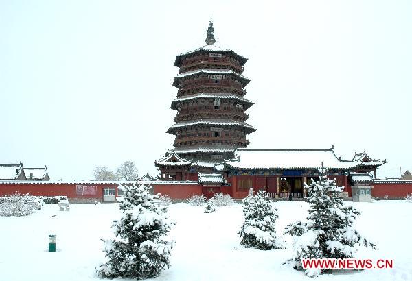 The undated file photo shows the Sakyamuni Pagoda in Yingxian County, north China's Shanxi Province. Authorities in north China's Shanxi Province said Sunday that they would finish the application for the Sakyamuni Pagoda, the oldest wooden structures in the world, by July for it to be included on the UNESCO list of cultural relics by 2013. 