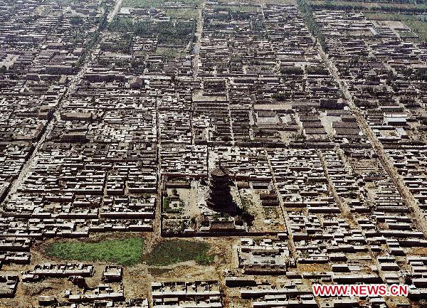 The undated file photo shows the Sakyamuni Pagoda in Yingxian County, north China's Shanxi Province. Authorities in north China's Shanxi Province said Sunday that they would finish the application for the Sakyamuni Pagoda, the oldest wooden structures in the world, by July for it to be included on the UNESCO list of cultural relics by 2013. 