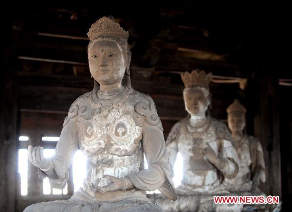 The undated file photo shows the Sakyamuni Pagoda in Yingxian County, north China's Shanxi Province. Authorities in north China's Shanxi Province said Sunday that they would finish the application for the Sakyamuni Pagoda, the oldest wooden structures in the world, by July for it to be included on the UNESCO list of cultural relics by 2013. 