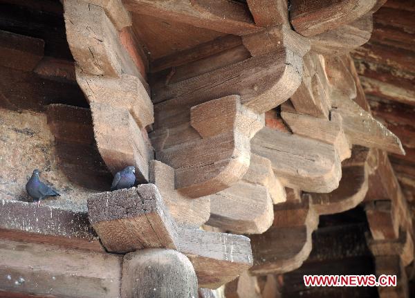 The undated file photo shows the Sakyamuni Pagoda in Yingxian County, north China's Shanxi Province. Authorities in north China's Shanxi Province said Sunday that they would finish the application for the Sakyamuni Pagoda, the oldest wooden structures in the world, by July for it to be included on the UNESCO list of cultural relics by 2013. 