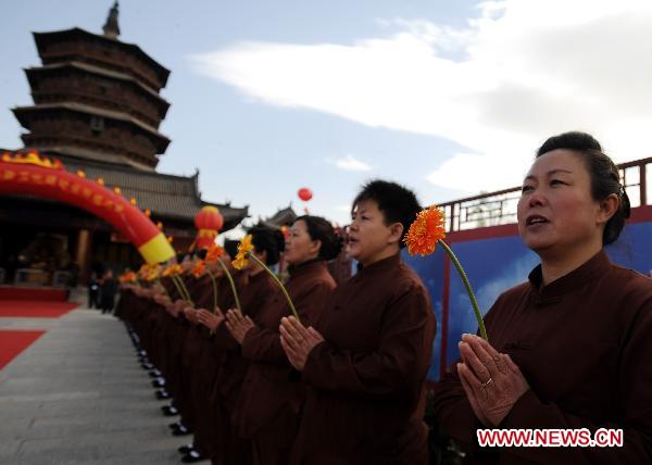 The undated file photo shows the Sakyamuni Pagoda in Yingxian County, north China's Shanxi Province. Authorities in north China's Shanxi Province said Sunday that they would finish the application for the Sakyamuni Pagoda, the oldest wooden structures in the world, by July for it to be included on the UNESCO list of cultural relics by 2013. 