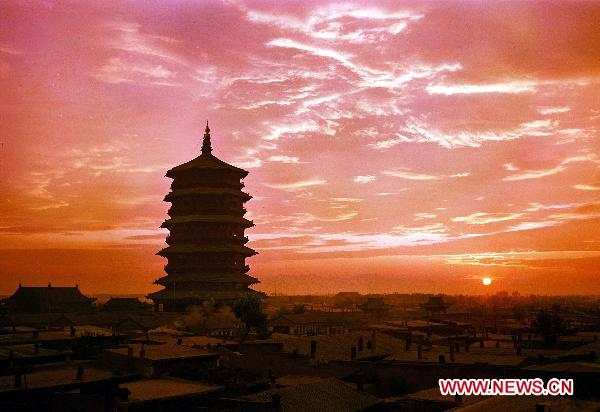 The undated file photo shows the Sakyamuni Pagoda in Yingxian County, north China's Shanxi Province. Authorities in north China's Shanxi Province said Sunday that they would finish the application for the Sakyamuni Pagoda, the oldest wooden structures in the world, by July for it to be included on the UNESCO list of cultural relics by 2013. 