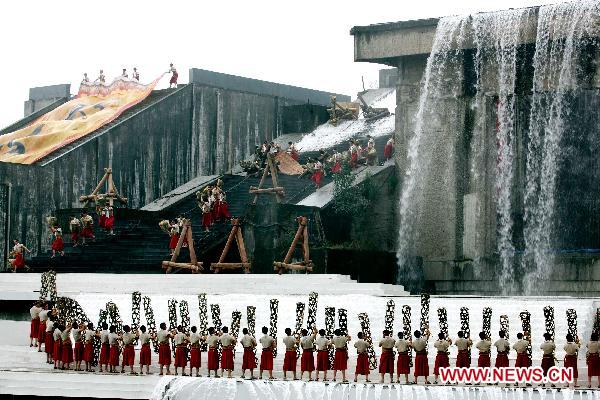 Photo taken on April 5, 2011 shows dancers perform during local Water-releasing Festival in Dujiangyan City, southwest China's Sichuan Province. 