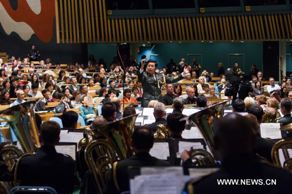 The Military Band of the People's Liberation Army of China and the Untied States Army Band 'Pershing's Own' perform during a joint concert at the United Nations headquarters in New York, the United States, May 20, 2011.