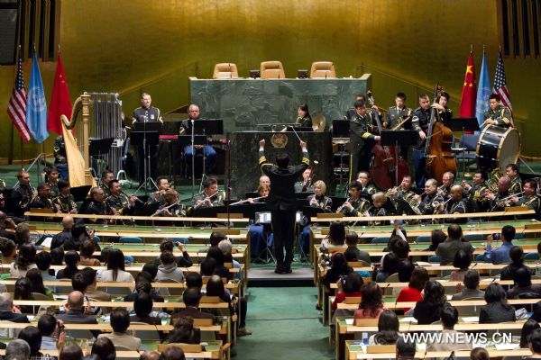 The Military Band of the People's Liberation Army of China and the Untied States Army Band 'Pershing's Own' perform during a joint concert at the United Nations headquarters in New York, the United States, May 20, 2011. 