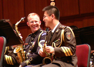 The Military Band of the People's Liberation Army of China and the Untied States Army Band 'Pershing's Own' perform during a joint concert at the United Nations headquarters in New York, the United States, May 20, 2011.