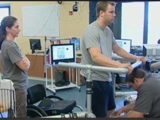 25-year-old Rob Summers, who was left paralyzed after a car accident, was able to stand and take a few steps following electrical stimulation of his spinal cord.