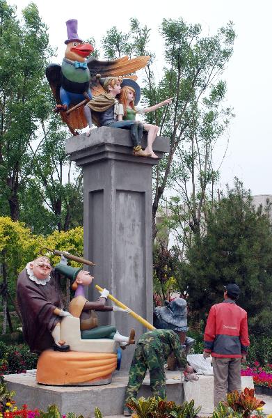 Photo taken on May 22, 2011 shows the cartoon sculptures before the gate of the National Animation Industry Park, in Tianjin, north China. National Animation and Industry Comprehensive Demonstration Park, the first national-level animation industry park in China, is scheduled to open at the end of May. 