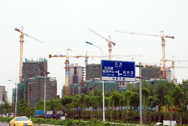 Photo taken on May 22, 2011 shows the Sino-Singapore Tianjin Eco-city, just beside the National Animation Industry Park, in Tianjin, north China. National Animation and Industry Comprehensive Demonstration Park, the first national-level animation industry park in China, is scheduled to open at the end of May. 