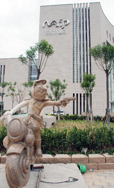 Photo taken on May 22, 2011 shows the cartoon sculptures of Chinese traditional characters, before the gate of the National Animation Industry Park, in Tianjin, north China. National Animation and Industry Comprehensive Demonstration Park, the first national-level animation industry park in China, is scheduled to open at the end of May.