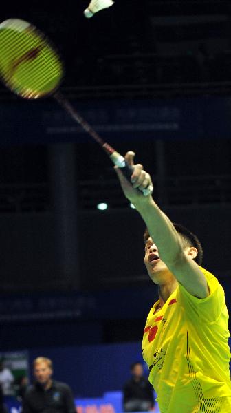China's Lin Dan returns the shot to Germany's Marc Zwiebler during the 2011 Sudirman Cup in Qingdao, east China's Shandong Province, May 22, 2011. The event started today. (Xinhua/Li Ziheng) 
