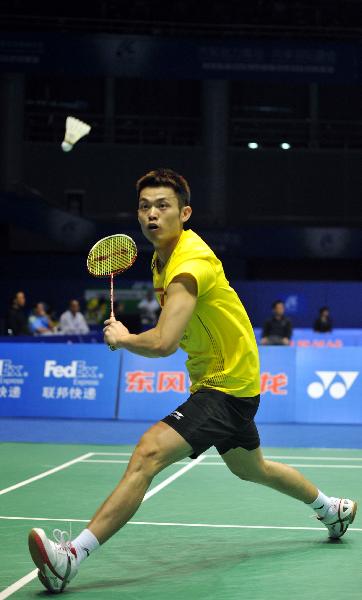 China's Lin Dan returns the shot to Germany's Marc Zwiebler during the 2011 Sudirman Cup in Qingdao, east China's Shandong Province, May 22, 2011. The event started today. (Xinhua/Li Ziheng) 