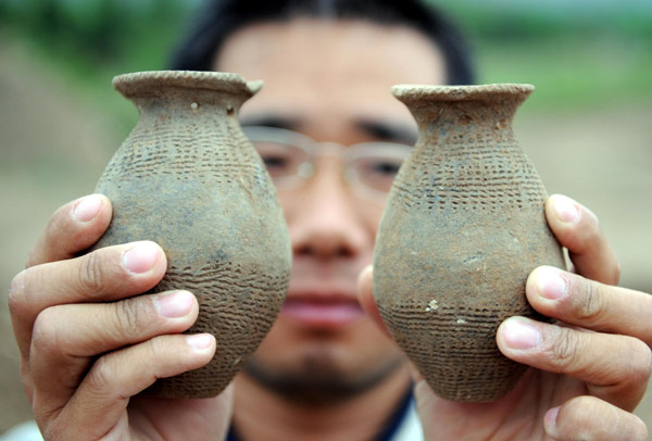 Ancient village unearthed in SW China