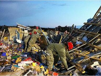 Missouri National Guard Soldiers with the 117th Engineer Team work search and rescue missions in Joplin, Missouri, hours after a deadly tornado passed through. (Photo by Ann Keyes courtesy Missouri National Guard) 