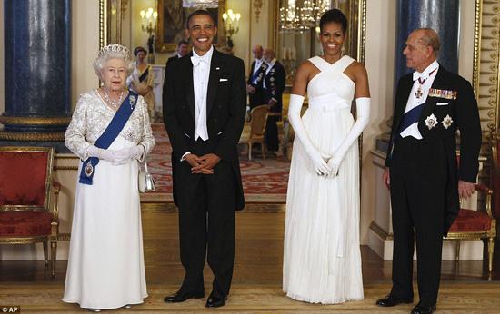 The lavish banquet, hosted by the Queen, was to honour the Obama's state visit, and the President and First Lady posed here with the Royal couple before enjoying their meal. 