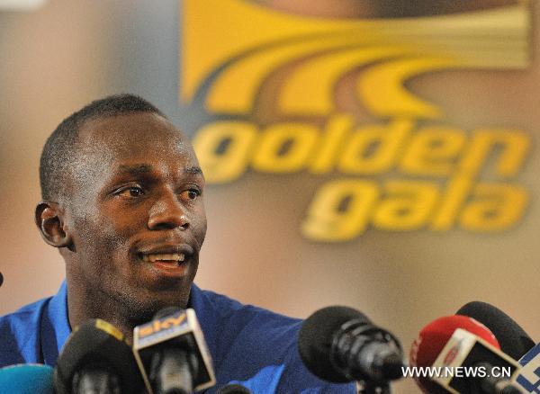 Olympic and world champion Usain Bolt attends a press conference in Rome, capital of Italy, May 24, 2011. Bolt will make his season debut in Thursday's Rome Golden Gala, part of the IAAF's Diamond League series. (Xinhua/Wang Qingqin)