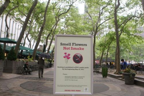 A sign at the entrance to Bryant Park notifies visitors of a new smoking ban May 23, 2011 in New York City. A new smoking law took effect in New York City Monday, prohibiting smokers from lighting up in certain public places including parks and beaches. [Daniel Barry/Getty Images]