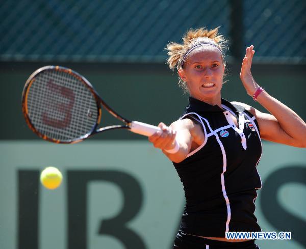 Polona Hercog of Slovenia returns the ball during the second round match of women's singles against Peng Shuai of China in the French Open tennis tournament at the Roland Garros in Paris May 25, 2011. Peng won 2-0. (Xinhua/Xu Liang) 