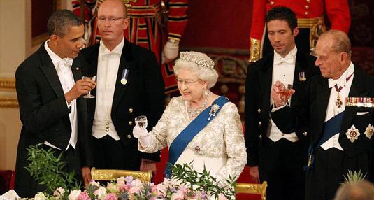 Cheers! The Queen toasts the Obama's visit before they sit down to a dinner of lamb, roast potatoes and vanilla Charlotte. 