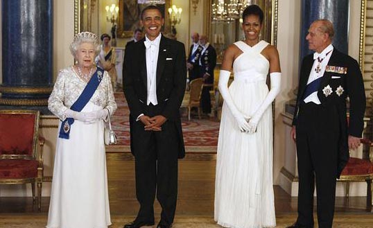 Dinner for 171: The lavish banquet, hosted by the Queen, was to honour the Obama's state visit, and the President and First Lady posed here with the Royal couple before enjoying their meal.. 