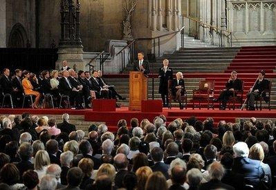 US President Barack Obama (C) gestures as he delivers a speech at the British parliament in London. 