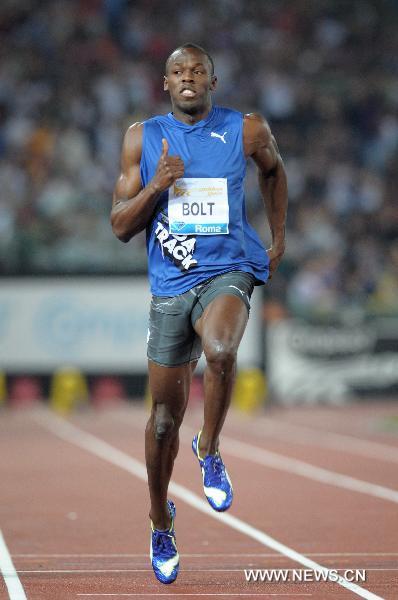 Usain Bolt of Jamaica competes during the men's 100m final at the Golden Gala IAAF Diamond League in Rome, Italy, May 26, 2011. Bolt won the title with 9.91 seconds. (Xinhua/Wang Qingqin) 