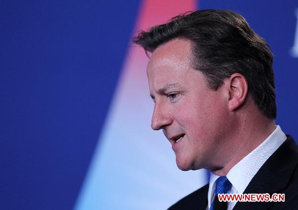 British Prime Minister David Cameron attends a press conference during the G8 summit, in Deauville, northwestern France, on May 27, 2011. [Gao Jing/Xinhua]