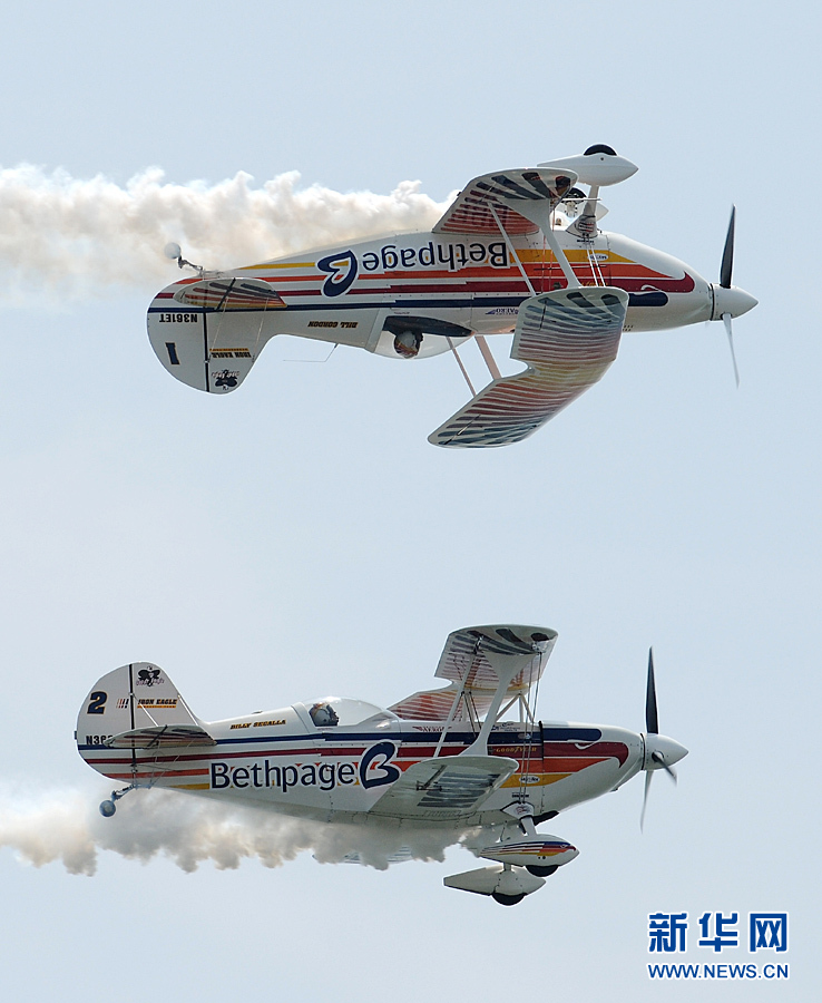 An aircraft performs aerobatics over Johns Beach in New York, the United States, May 28, 2011. 